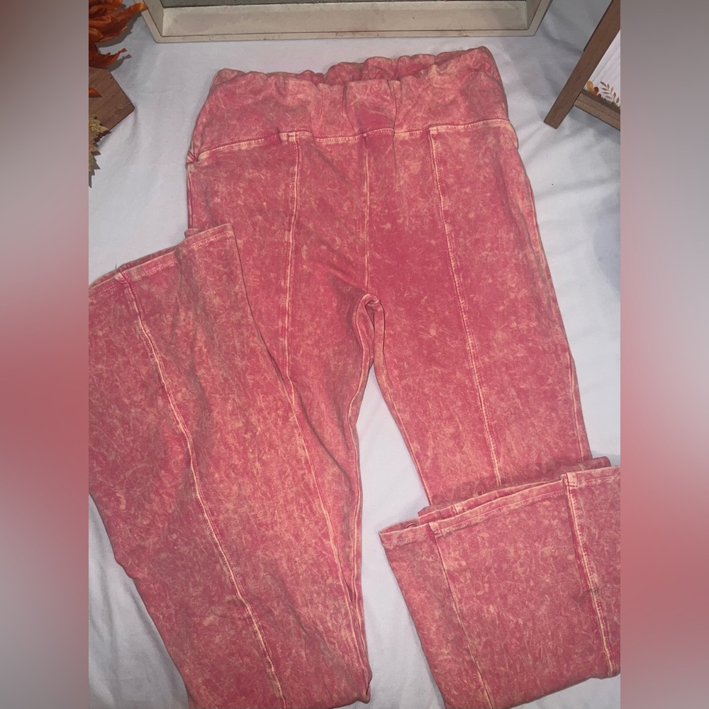 Trendy Pink Women's Jeggings with wide bottoms.